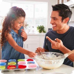 Father and daughter baking