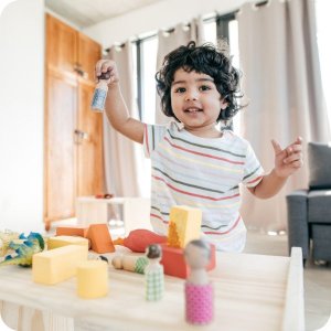 toddler playing alone