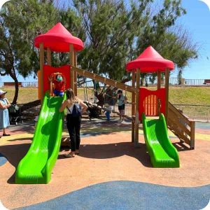 Young kids play area with slides